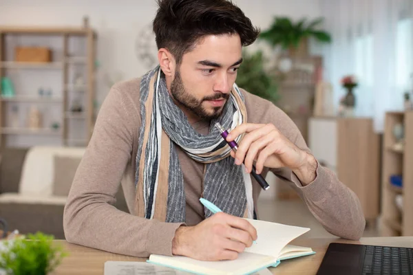online studying class student man writing on notebook