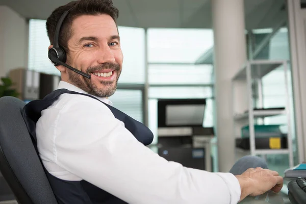 Businessman Wearing Headset Busy Telesales Office Smiling Camera — Stock Photo, Image