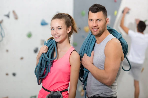 Fit Couple Rock Climbing Indoors Gym — Stock Photo, Image