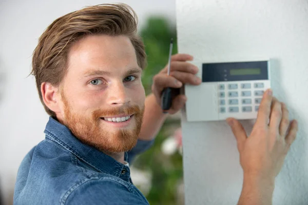 Male Electrician Installing Security System Door Sensor Wall — Stock Photo, Image