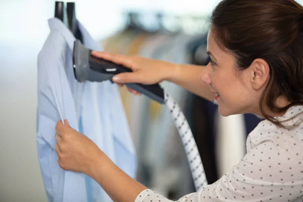 Woman Steaming Shirt Dry Cleaners — Stockfoto