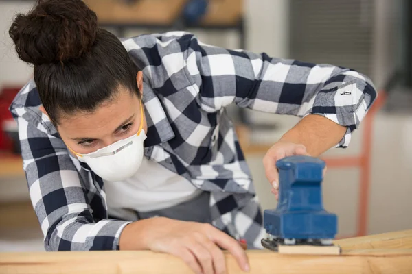Assiduous Young Female Woodworker Wearing Safety Mask — Stock Photo, Image
