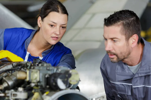 Man Woman Working Airplane Engine — 스톡 사진