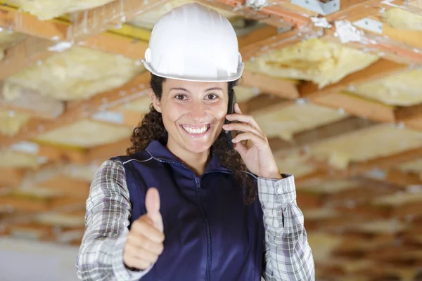 Female Construction Worker Thumbs Phone — 스톡 사진