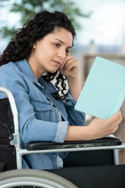 Young Woman Wheelchair Reading Book — Stok fotoğraf