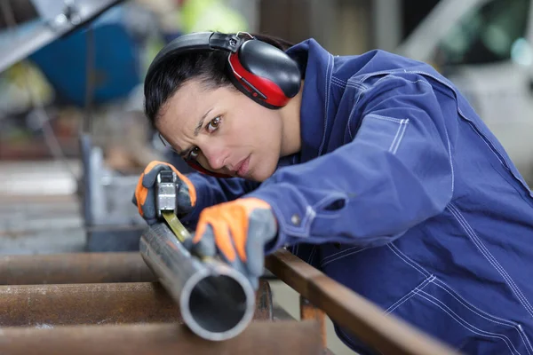 Worker Measures Marks Something Pipes — Fotografia de Stock