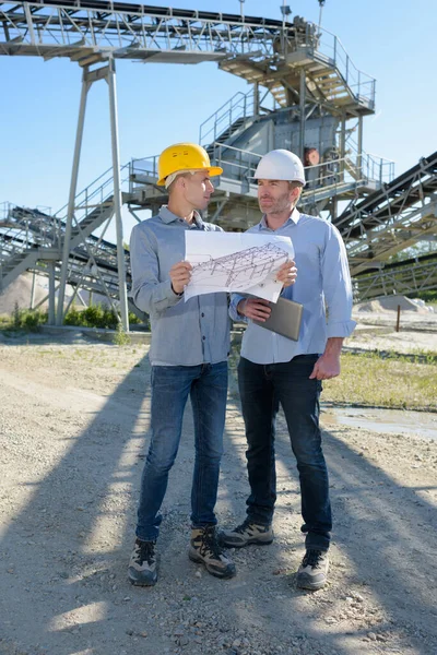 Two Engineers Checking Architectural Plan Outdoors — Stock Photo, Image