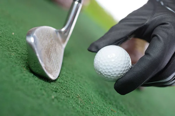 Close Hand Placing Golf Ball — Stok fotoğraf