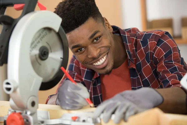 Portrait Young Male Carpenter Using Circular Saw — 스톡 사진