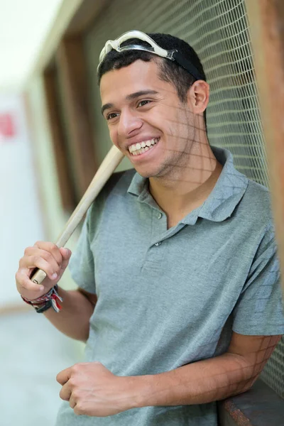 Happy Young Sportsman Holding Wooden Bat — Fotografia de Stock