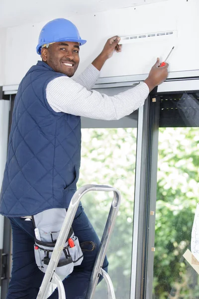 Man Installing Window Curtains House — 图库照片