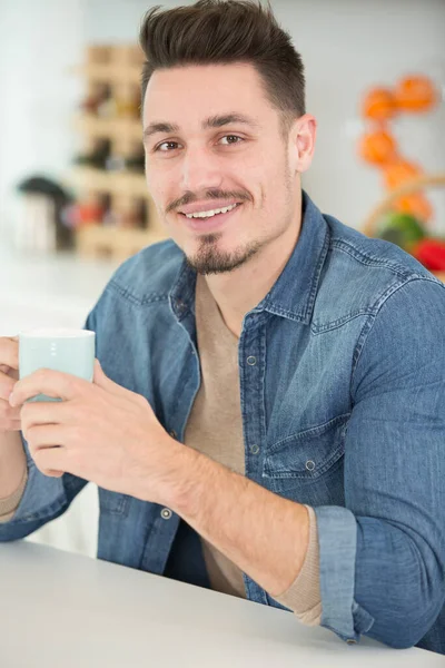 Young Man Enjoying Cup Coffee Home — Foto Stock
