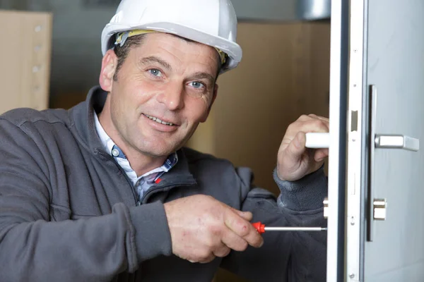 Locksmith Using Screwdriver Door — Fotografia de Stock