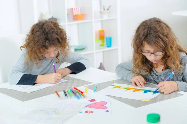 Two Girls Colouring — Zdjęcie stockowe