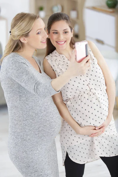 Pregnant Women Doing Selfie — 图库照片