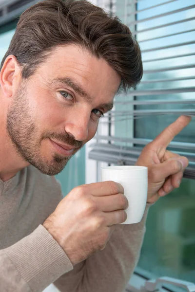 hipster or bearded man having a coffee