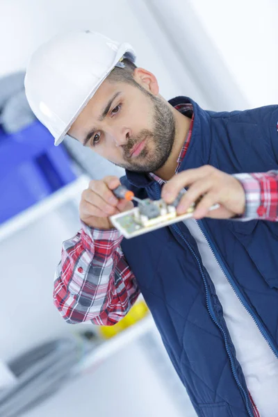 Man Countersinking Screw Workshop Using Screwdriver — Stock Photo, Image