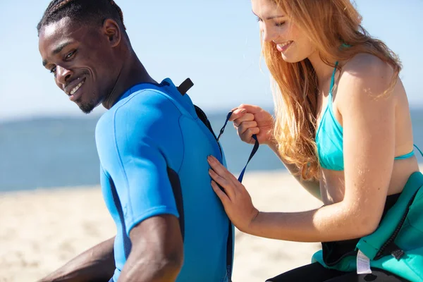 Profile View Couple Wearing Wetsuits Surfing Beach — Stock Photo, Image