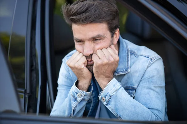 sad man and car crash accident