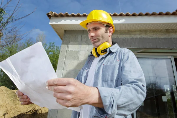 Male Worker Checking Plan Outdoors — Stock Photo, Image