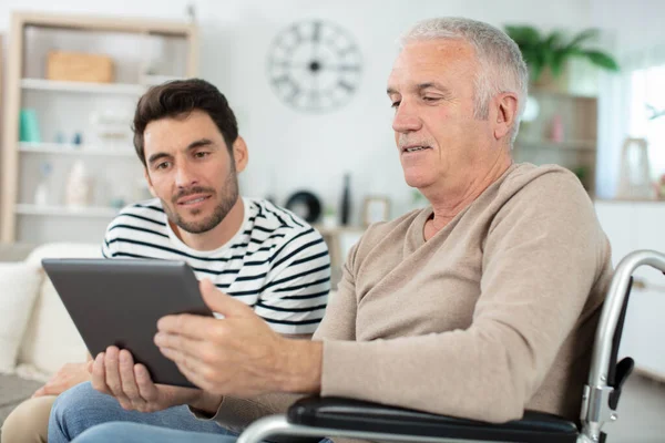 Handsome Man Taking Care His Eldery Father Wheelchair — Stock Photo, Image