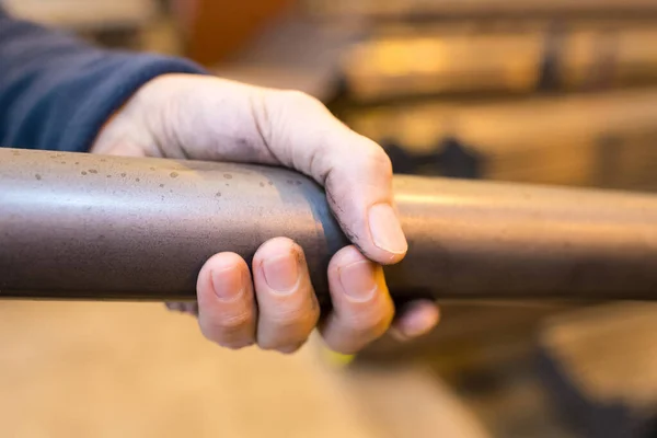 Metalworkers Hand Iron Bar — Stock Photo, Image