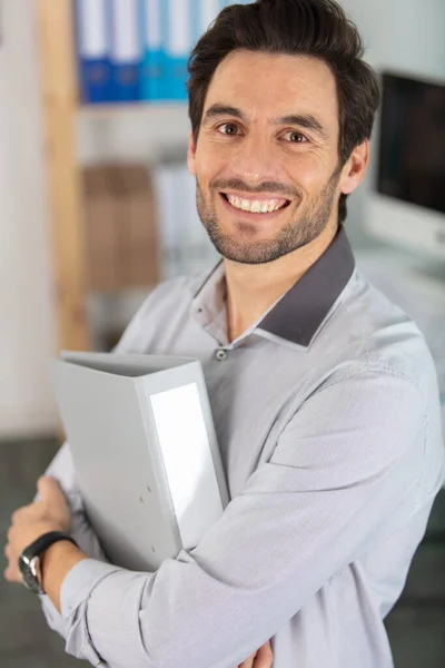 Smiling Mature Man Holding Folder — Stock Photo, Image