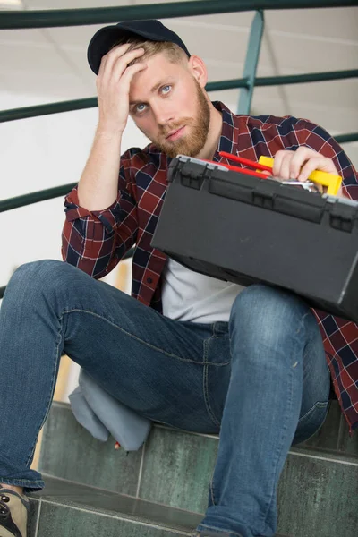 Young Electrician Sitting Stairs Indoors — Stock Photo, Image