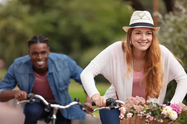 Happy Couple Chasing Bike Outdoors — Stock Photo, Image