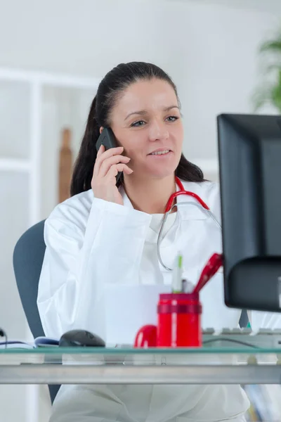 Doctor Sitting Desk Writing — Stock Photo, Image