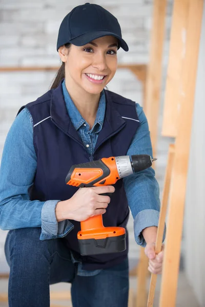 Female Worker Using Drill Wooden Pieces — 图库照片