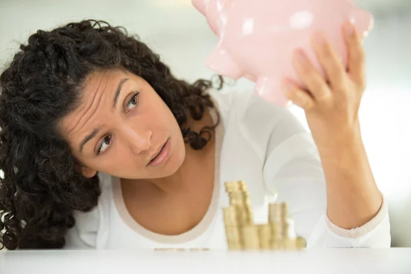 Woman Emptying Piggybank — Stock Photo, Image