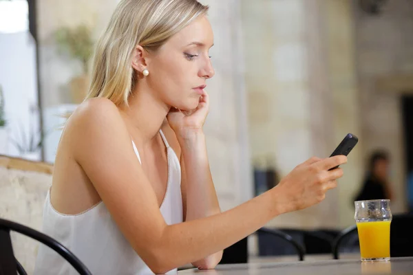 Blonde Pensive Beautiful Woman Using Smart Phone — Stock Photo, Image