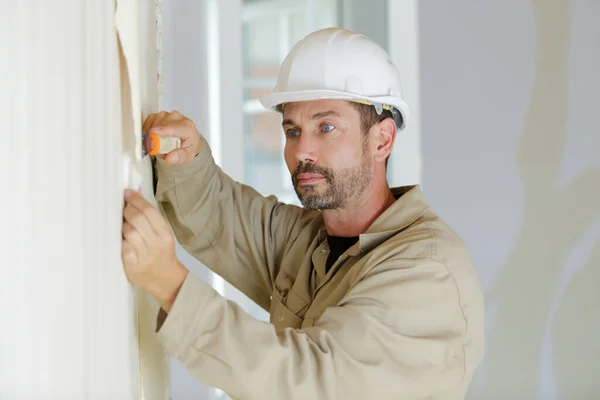 Contractor Removing Old Wallpaper Scraper — Stock Photo, Image