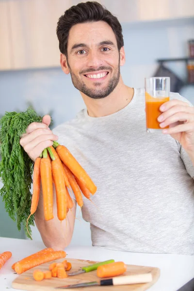 Young Man Holding Jar Carrot Smoothie — Stock Photo, Image