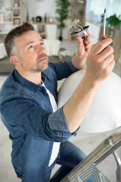 Electrician Mounting Ceiling Lamp Installing Wires — Foto de Stock