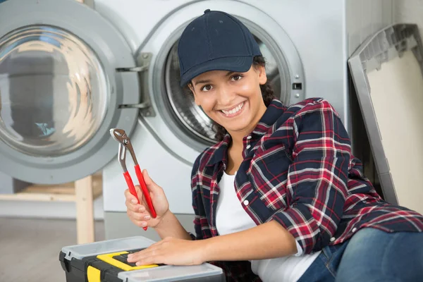 Lady Holding Pliers Repair Washing Machine — Stock Photo, Image