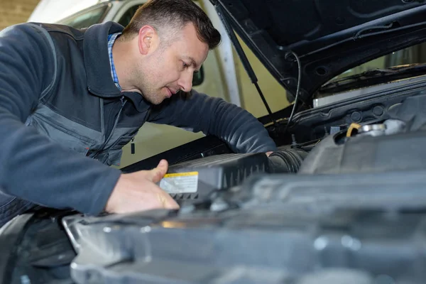 Man Changing Boot Parts Stock Image