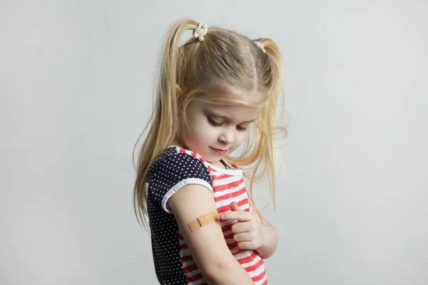 Child Vaccination Little Girl Showing Adhezive Arm Bandage Studio Shot — Stockfoto