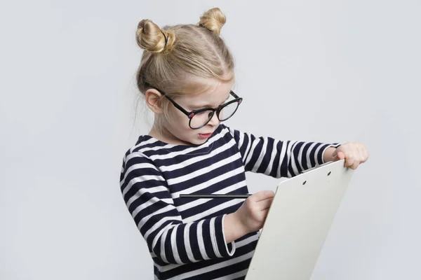 Portrait Adorable Little Girl Reading Glasses Pen Paper Business Education — Zdjęcie stockowe