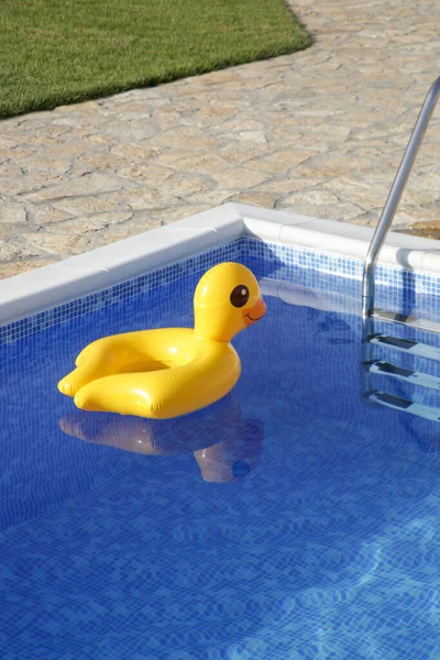 Inflatable Yellow Duck Floating Swimming Pool —  Fotos de Stock