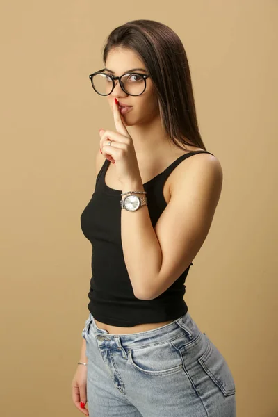 Studio Portrait Attractive Young Woman Showing Finger Lips Silent Gesture — Foto Stock