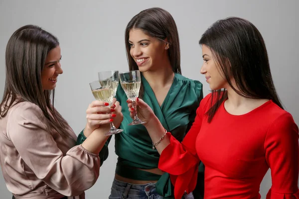 Three Women Clinking Crystal Wine Glasses — ストック写真