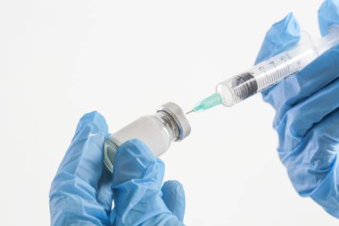 Scientist or medical worker holds vaccine bottle.Vaccination, immunization, treatment to provides active acquired immunity to a particular infectious disease. Healthcare And Medical concept.