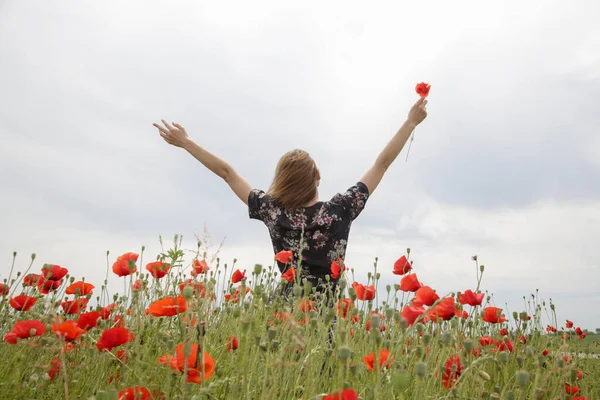 Young Woman Floral Dress Raised Arms Poppy Field Relaxing Carefree — Stock Photo, Image