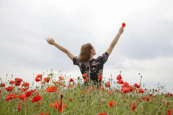 Young Woman Floral Dress Raised Arms Poppy Field Relaxing Carefree — Stock Photo, Image