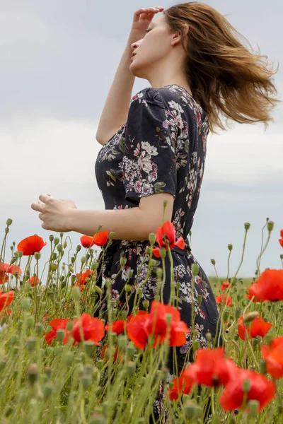 Young Woman Floral Dress Raised Arms Poppy Field Relaxing Carefree — Stock Photo, Image