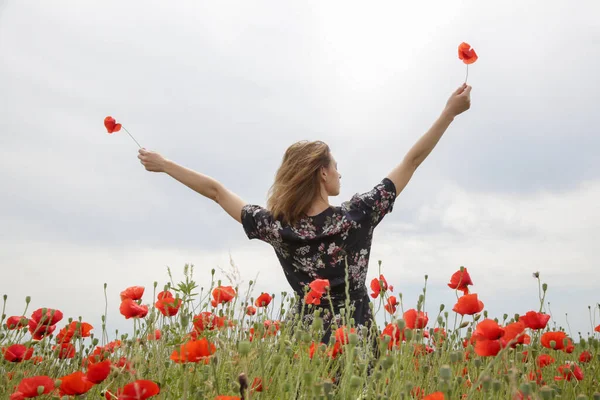 Young Woman Floral Dress Raised Arms Poppy Field Relaxing Carefree — Stock Photo, Image