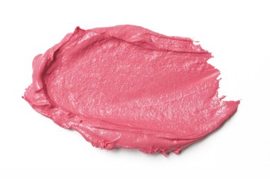 Beyaz arka planda pembe renkli makyaj örneği var. Dekoratif kozmetik leke.