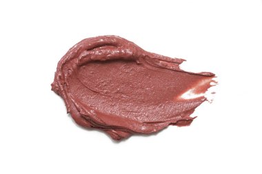 Kahverengi kremalı makyaj örneği beyaz arka planda izole edilmiş. Dekoratif kozmetik leke.